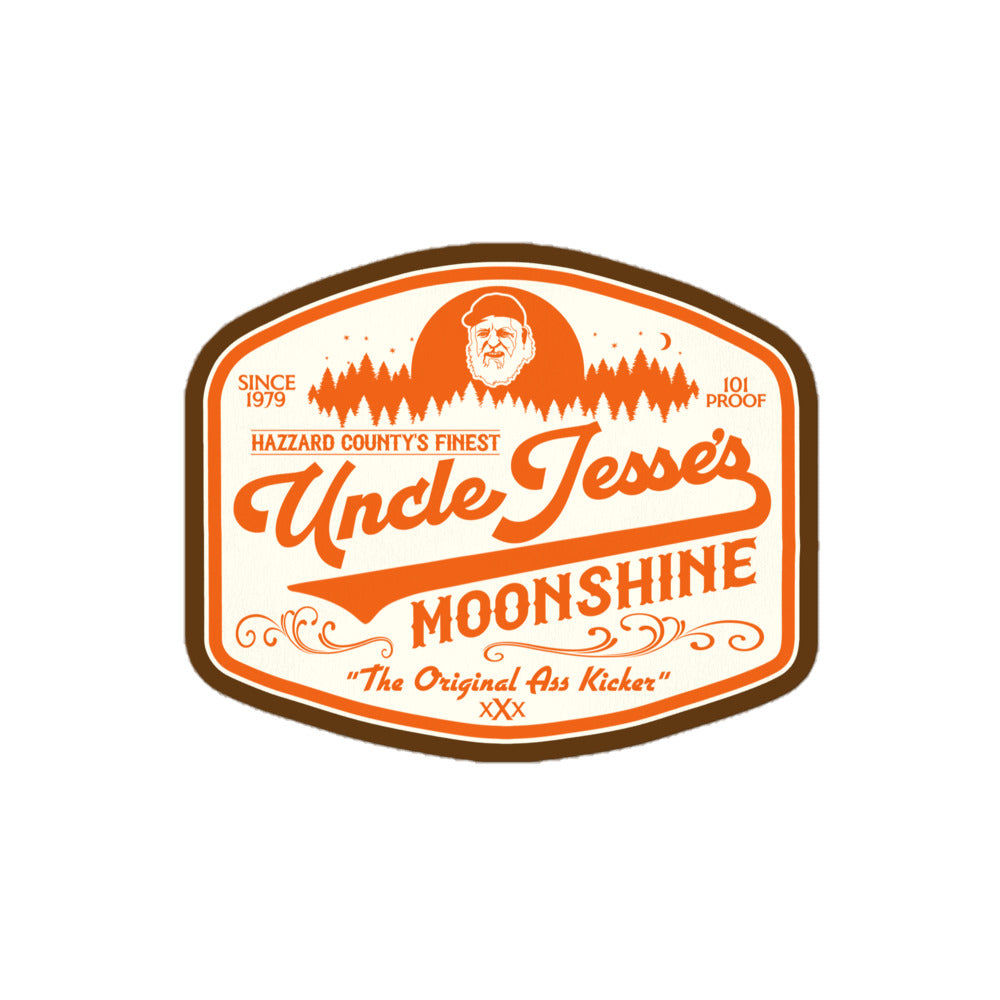 A retro kiss cut sticker that says Uncle Jesse's Moonshine, Hazzard County's Finest, 101 Proof, Since 1979, and "The Original Ass Kicker" in orange. Image of Uncle Jesse logo, a man with a white beard against a forest landscape in orange. References the TV show The Dukes of Hazzard. 