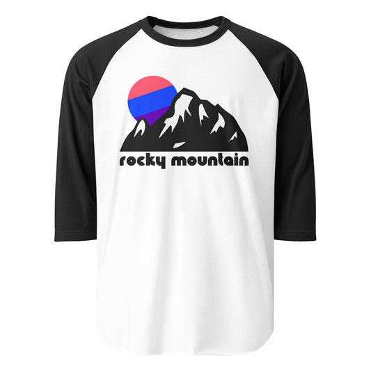 A three quarter sleeve raglan style black and white vintage shirt that says 'rocky mountain' beneath the picture of a mountainous landscape with snowy peaks and a setting tricolored blue, pink, and purple sun. References Colorado's incredibly famous Rocky Mountain National Park with stunning hiking and skiing trails, incredible wildlife, cool history like the discovery of gold and minerals and the Gold Rush, and picturesque alpine lakes. 