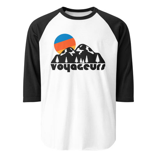 A three quarter sleeve black and white colored retro raglan style shirt that says "Voyageurs" and has the image of mountains covered in snow, evergreen trees, and a setting blue, orange, and yellow sun. References Voyageurs National Park near International Falls,  Minnesota, named after the voyageurs - the French-Canadian fur traders who explored the waterways there - and great for kayakers, canoeists, boaters, and fisherman, located near the Boundary Waters Canoe Area Wilderness. 