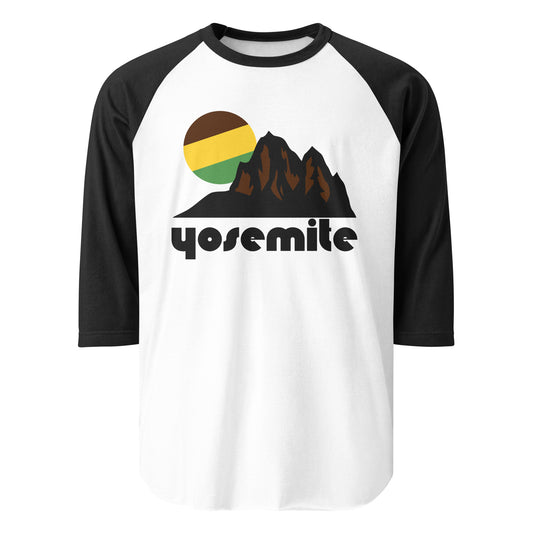 A white and black 3/4 sleeve raglan style shirt that says Yosemite, the Californian national park in the Sierra Nevadas, with an image of stunning mountains and a tricolored green/yellow/brown sun. 