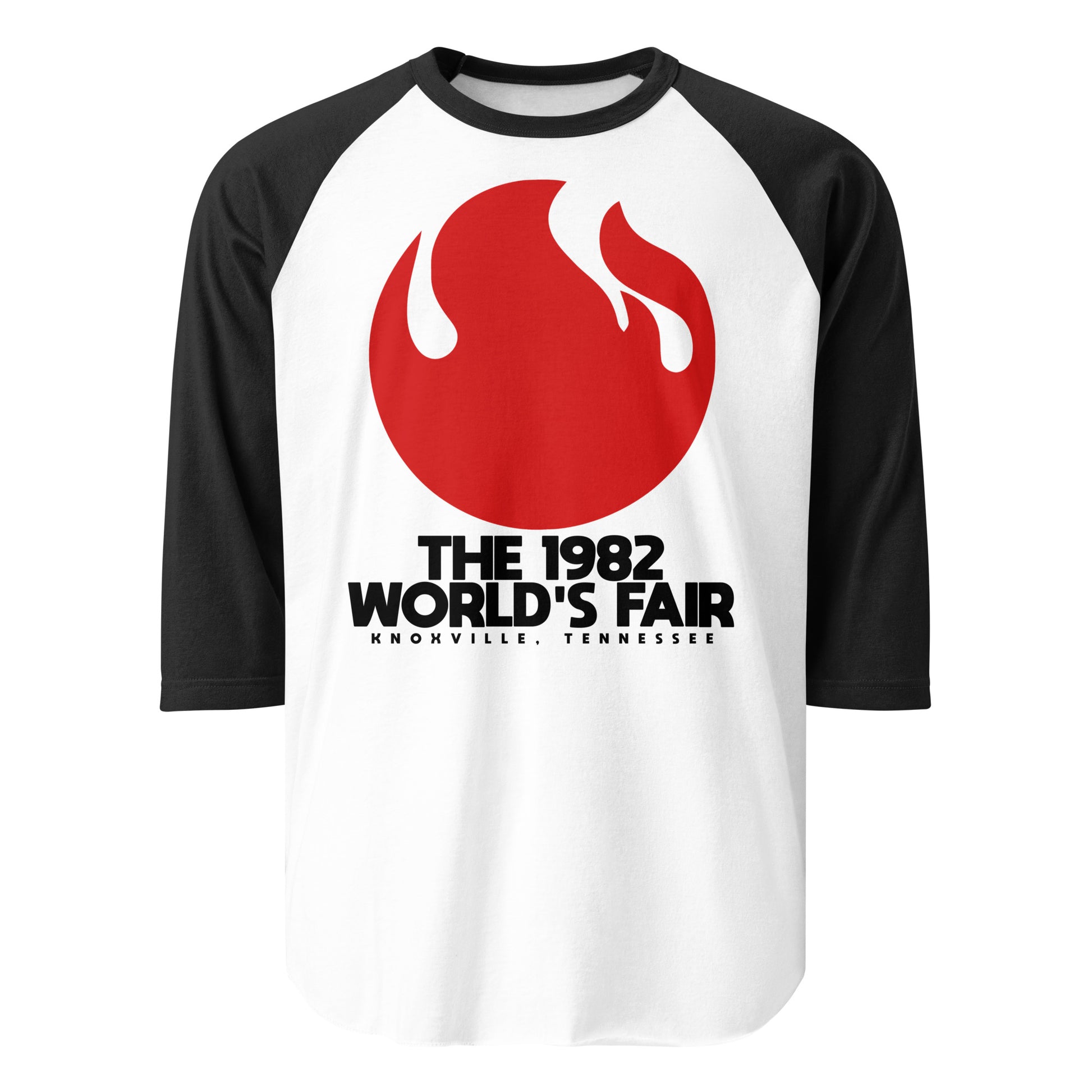 A 70s style three quarter sleeve raglan black and white shirt that says "The 1982 World's Fair Knoxville, Tennessee" with the image of a red flame. The theme was "Energy Turns the World." 