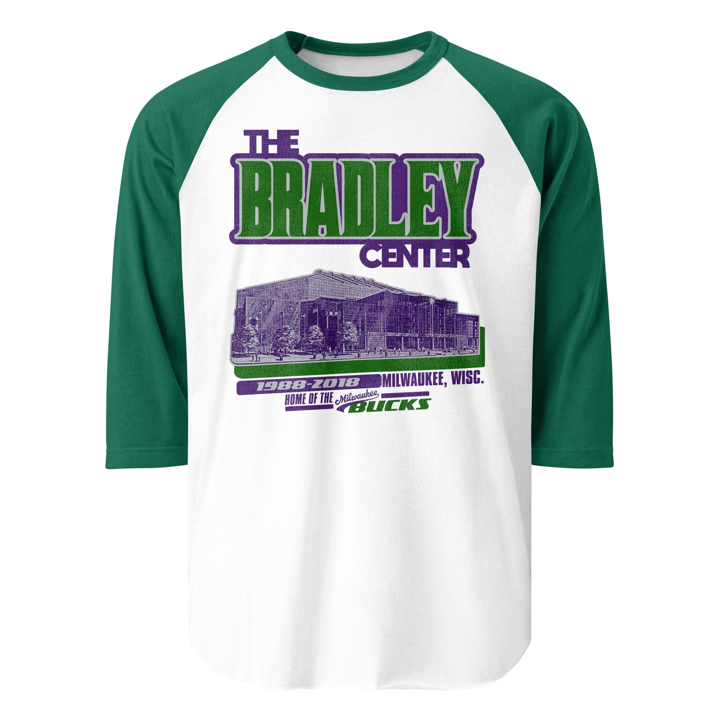 A 3/4 sleeve raglan style green and white retro shirt for The Bradley Center in Milwaukee, Wisc., Home of the Milwaukee Bucks from 1988-2018. Image of the stadium from the street in purple with a green shadow, representing the Bucks colors. 