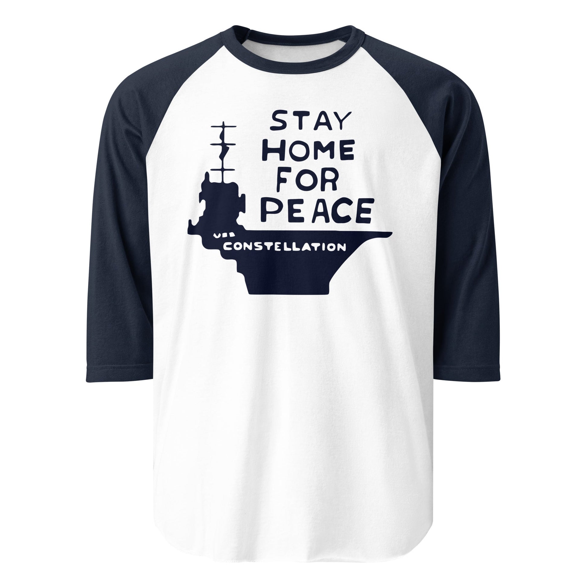 A vintage raglan style navy and white  "Stay Home for Peace" shirt. Image of large "USS Constellation" aircraft carrier from San Diego. References peace activist Connie Picciotto and the Connie Vote referendum. 
