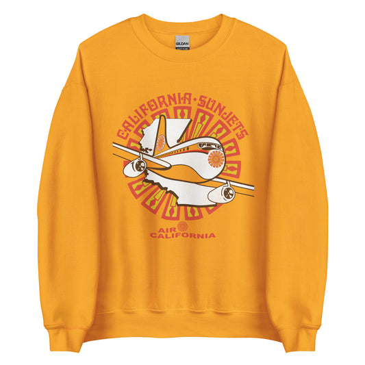 A retro 80s style orange gold crew neck sweatshirt that says "California Sunjets" with an airplane with the flower, circular, spiky orange and yellow Cal Air logo flying over the state of California and on top of the airline's logo. Says "Air California." 