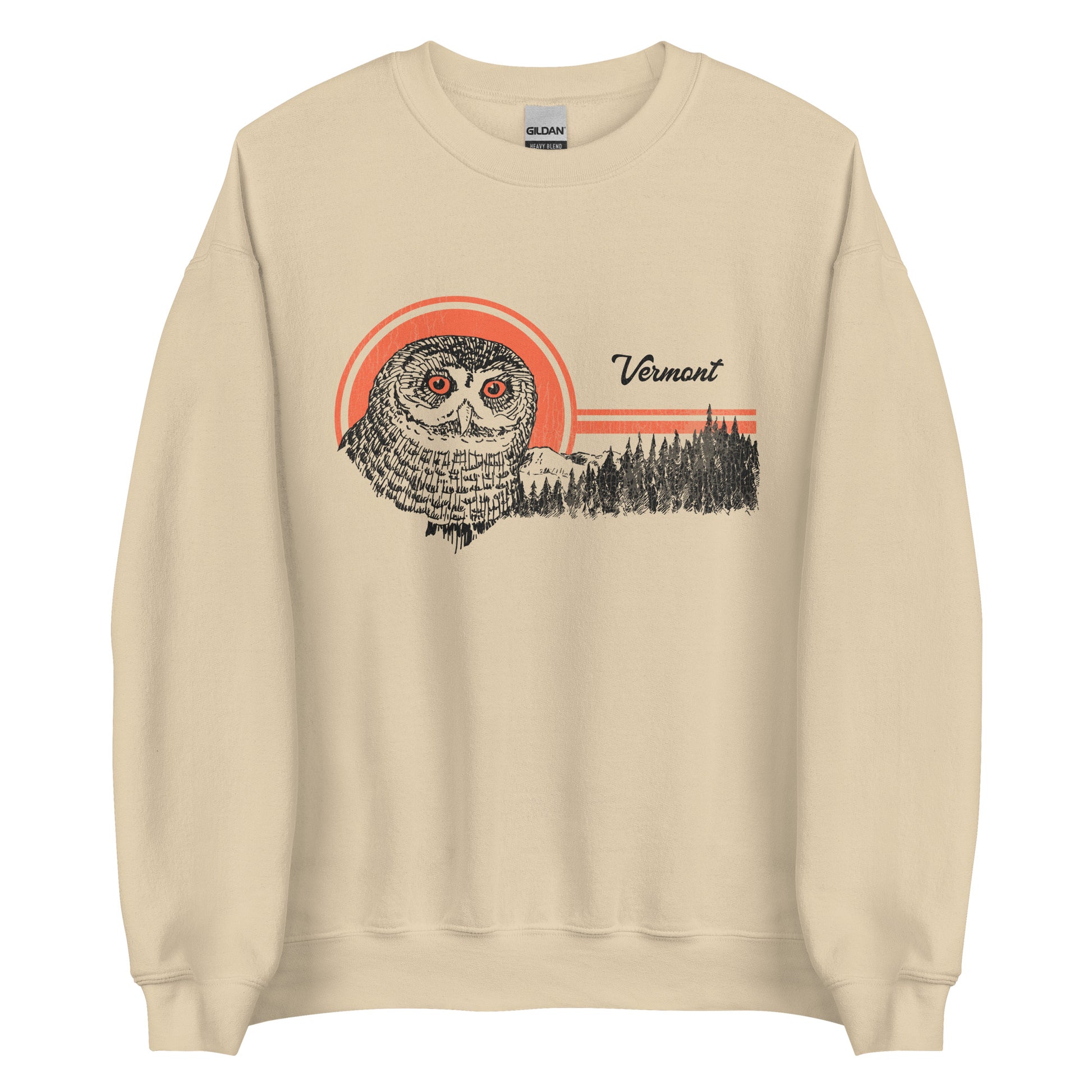 A sand colored retro crew neck sweatshirt that says "Vermont" with an owl with piercing orange eyes and an east coast forest and mountain landscape. 
