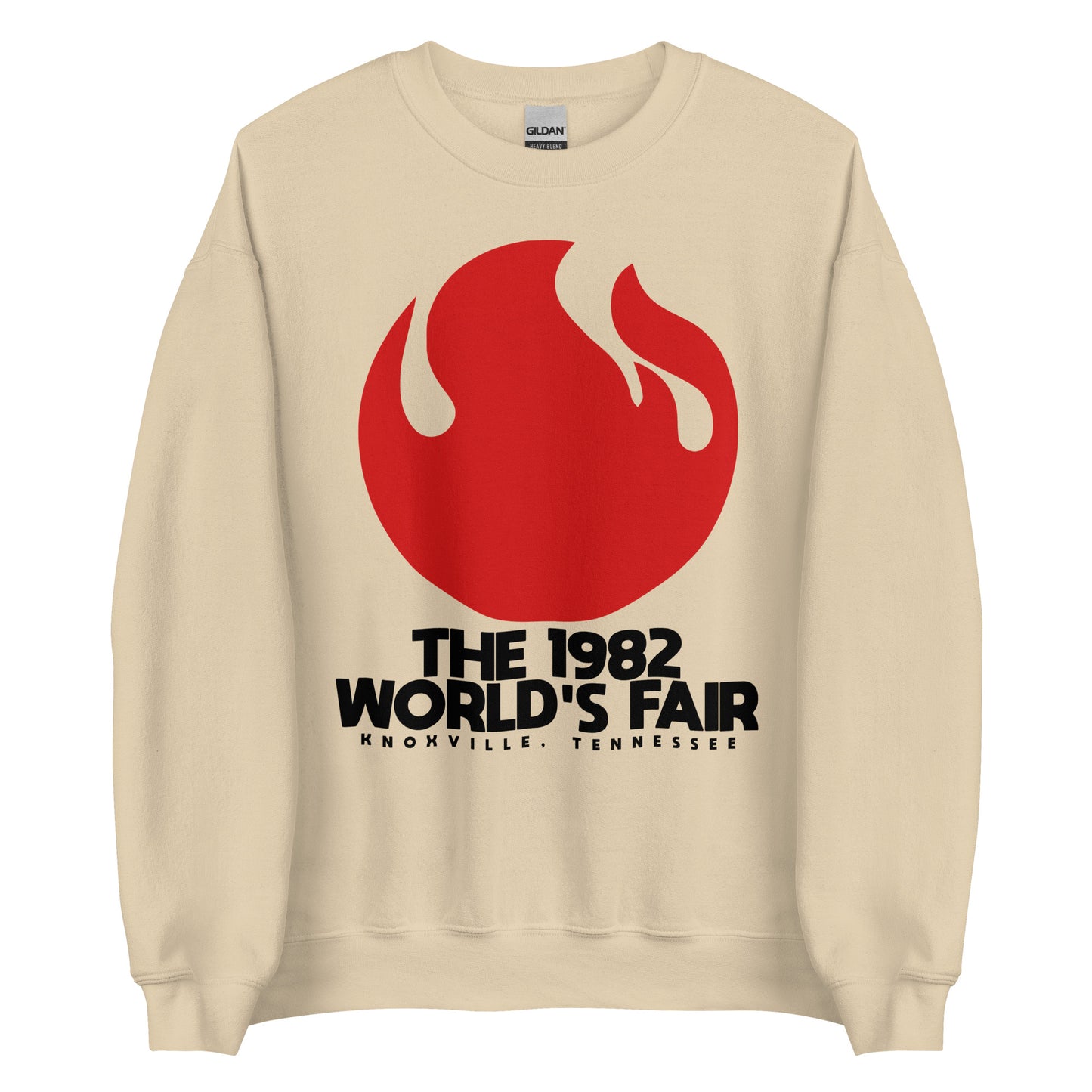 A souvenir crew neck sand colored sweatshirt with a fire flame image that says "The 1982 World's Fair Knoxville, Tennessee". 