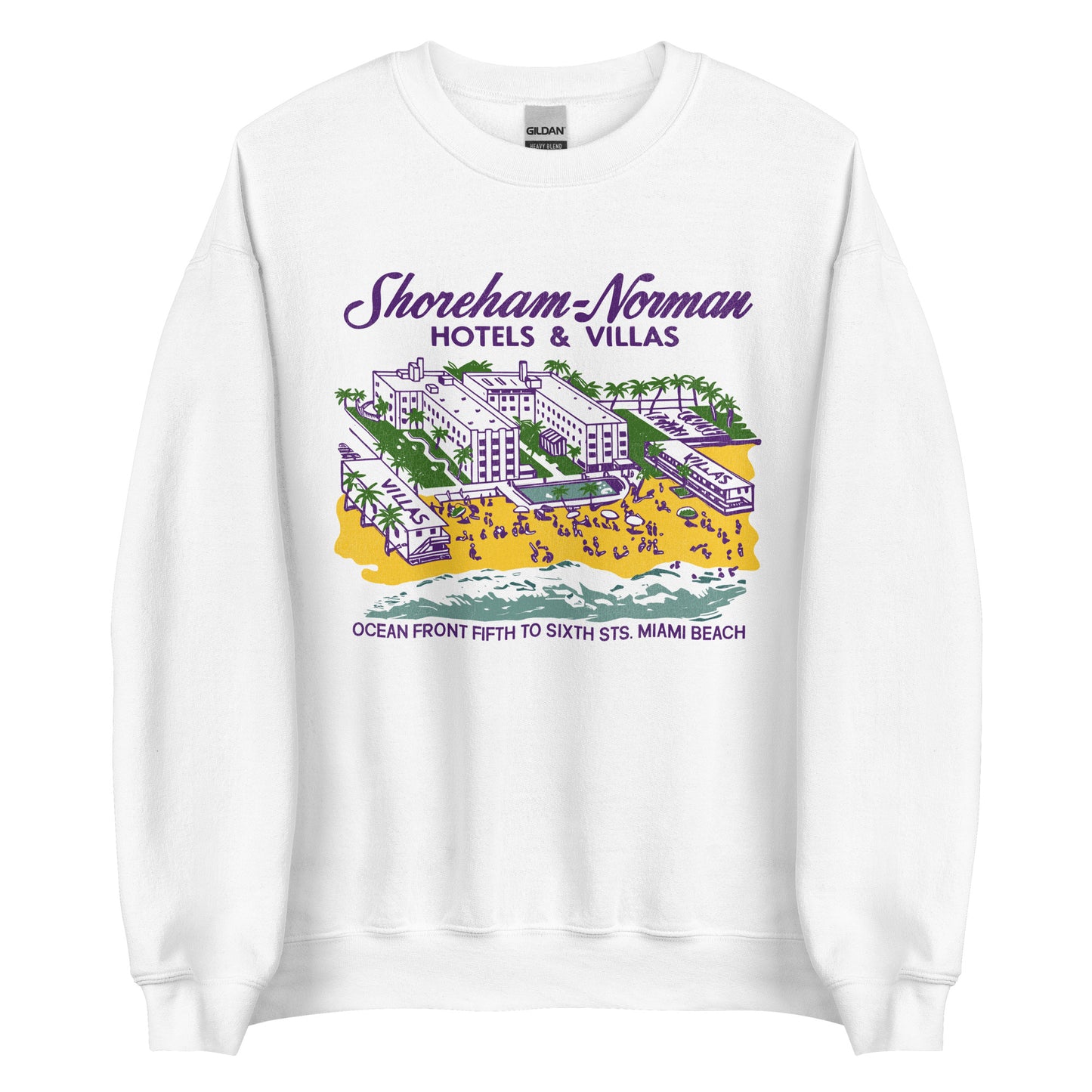A retro unisex white crew neck sweatshirt with text reading "Shoreham Norman Hotels & Villas Ocean Front Fifth to Sixth Sts. Miami Beach". Has the image of a Florida hotel with villas, a sandy beach, tourists, a pool, and palm trees. Refers to the Twin Hotels and Motels. 