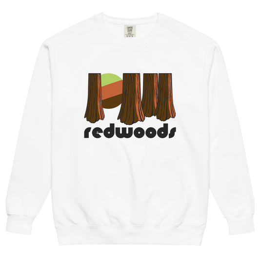 A retro, white colored crew neck "redwoods" sweatshirt for tourists and hikers that references California's Redwood National Park with an image of the incredible redwood tree trunks and a green and brown sun shining through. 