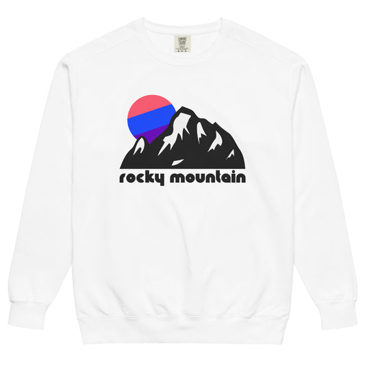 A vintage, tourist Rocky Mountain National Park white crew neck sweatshirt with the image of a large mountain with multiple peaks, crags, and crevices, snow on its side, as a large circular pink, blue, and purple sun sets in the distance. References Colorado's Rocky Mountain National Park, famous for its tall elevation, its many 14,000+ foot mountains, and incredible hiking and skiing trails, as well as picturesque tourist towns. 