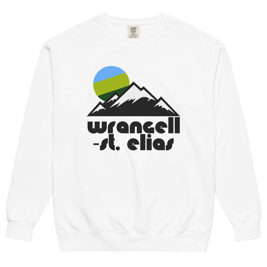A white colored retro 70s style Wrangell-St. Elias National Park and Preserve crew neck sweatshirt with a mountain landscape and setting sun image. Known as America's largest national park, Wrangell-St. Elias boasts one of the largest North American active volcanoes, Mt. Wrangell, and the greatest concentration of glaciers in North America. 