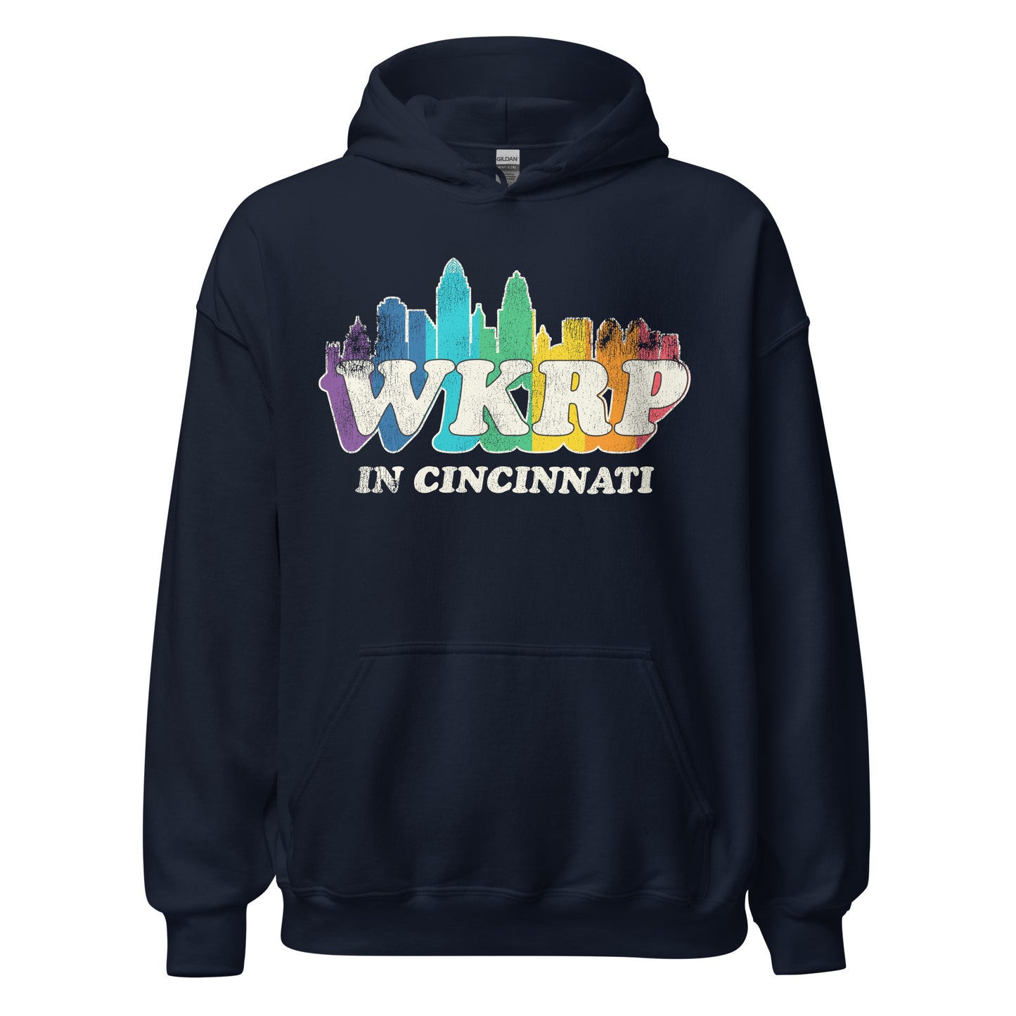 A retro navy blue hoodie sweatshirt for travel that says WKRP in Cincinnati with an image of a rainbow Cincinnati, Ohio skyline. In reference to the sitcom TV series created by Hugh Wilson. 