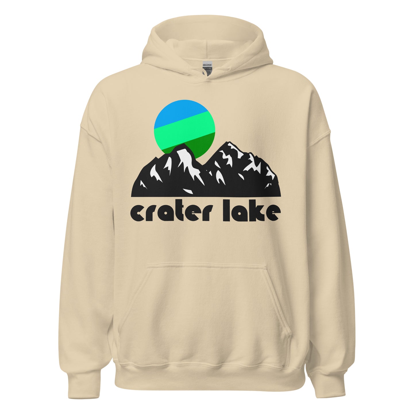 A retro, vintage sand colored hooded sweatshirt that says Crater Lake underneath the image of a large mountain and tricolored cool toned sun. In reference to Crater Lake National Park in Oregon, which contains the deepest lake in the USA with the stunning backdrop of the Cascade Mountain Range, a prime location for hikers, artists, photographers, tourists, backpackers, and sightseers. 
