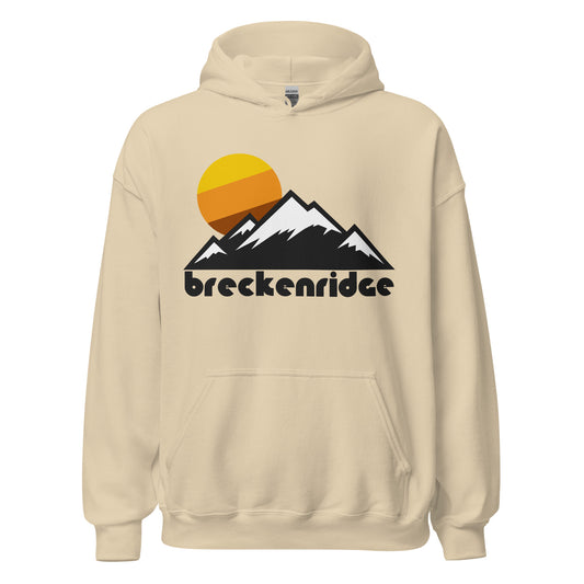 An 80s style, vintage sand colored hoodie sweatshirt that reads "breckenridge" under the image of a mountain range, the peaks snow covered, and a tricolored warm toned sun setting. References Breckenridge Mountain Resort in Colorado, a world class ski and snowboard resort with trails on Breck's Five Peaks in the Tenmile Range, part of the Mosquito Range, part of the Rocky Mountains. 