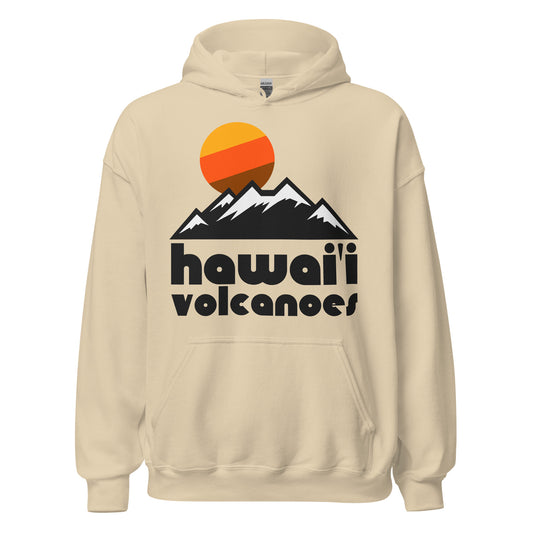 A "Hawai'i Volcanoes" vintage souvenir hooded sweatshirt in sand color. Includes the image of a mountain landscape and a beautiful orange, yellow, and brown sun. In reference to Hawai'i Volcanoes National Park, known as a UNESCO World Heritage Site, located on the Big Island. The park is known for Kīlauea and Mauna Loa Volcanoes, both active, and Halema'uma'u Crater. 