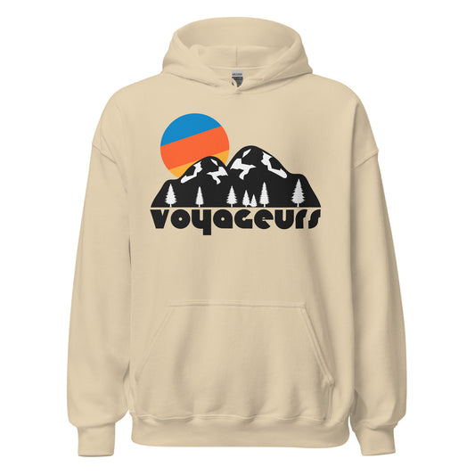A sand colored Voyageurs National Park hooded sweatshirt with images of a mountainous landscape, evergreen trees dotting the ground, and a blue, orange, and yellow sun setting. Known for stargazing, boating, kayaking, canoeing, and camping, the national park is Minnesota's only, and sits almost at the Canadian border nearby the Boundary Waters Canoe Area. 