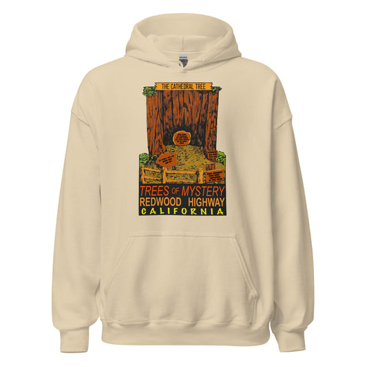 A  70s style vintage sad colored hooded sweatshirt with an image of "The Cathedral Tree", a hollow redwood behind a wooden fence. There are multiple historical signs which read "Many Weddings Have Been Performed At This Site", "Estimated Age Over 500 Years", "Sink Down, Oh Traveler, On Your Knees, God Stand Before You In These Trees", and "So Shall They Live When Ends Our Day". The sweatshirt says "Trees of Mystery", "Redwood Highway", and "California", the location. 