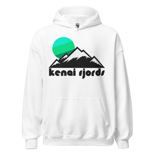 An 80s style white colored hoodie sweatshirt that says Kenai Fjords in bold, black lettering under the image of snow covered peaks and a blue/green sun. References the famous Alaskan national park - known for its glacial wonderland ice fields - near Seward, a town often called the Gateway to Kenai Fjords National Park. 