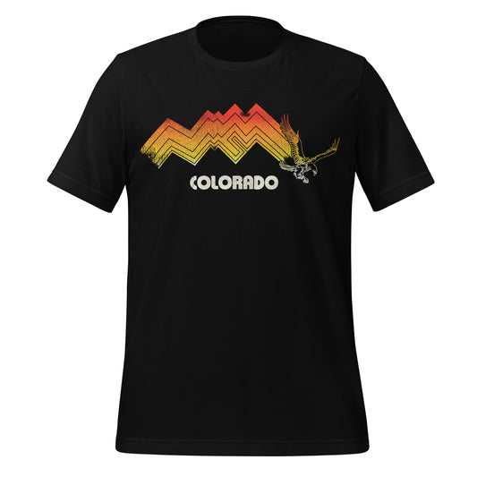 A black 80s t-shirt with the Rocky mountain range image in reds, oranges, and yellows with an eagle and the word Colorado. 