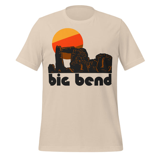 A soft cream colored retro Big Bend t-shirt that includes a red rock landscape and yellow/red/brown sun graphic. In Reference to the Texas national park in the Chihuahuan Desert, including the Rio Grande River and the Chisos Mountains, a popular destination for birdwatching, hiking, backpacking, and stargazing. 