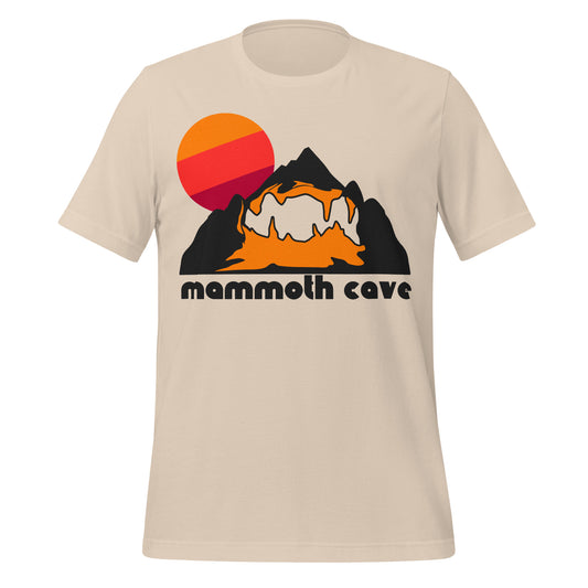 A vintage, souvenir soft cream colored "mammoth cave" t-shirt that includes a rendering of a black colored mountain with an orange inside and caves carved out within and an orange/red/magenta colored sun, referencing Mammoth Cave National Park is known for including the longest cave system in the world. 