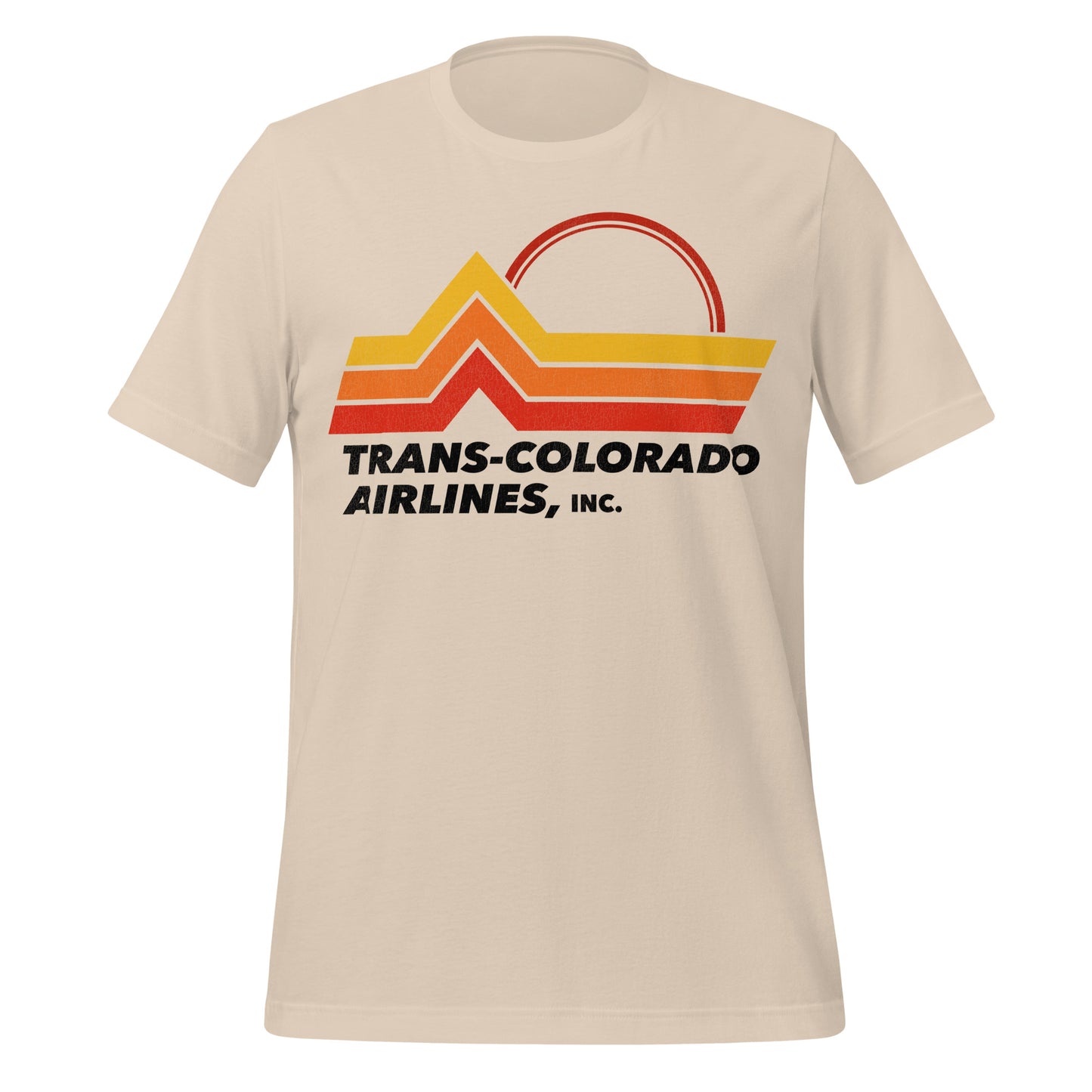 A 70s style soft cream t-shirt with the Trans-Colorado Airlines, Inc. logo of mountains and a red sun. 
