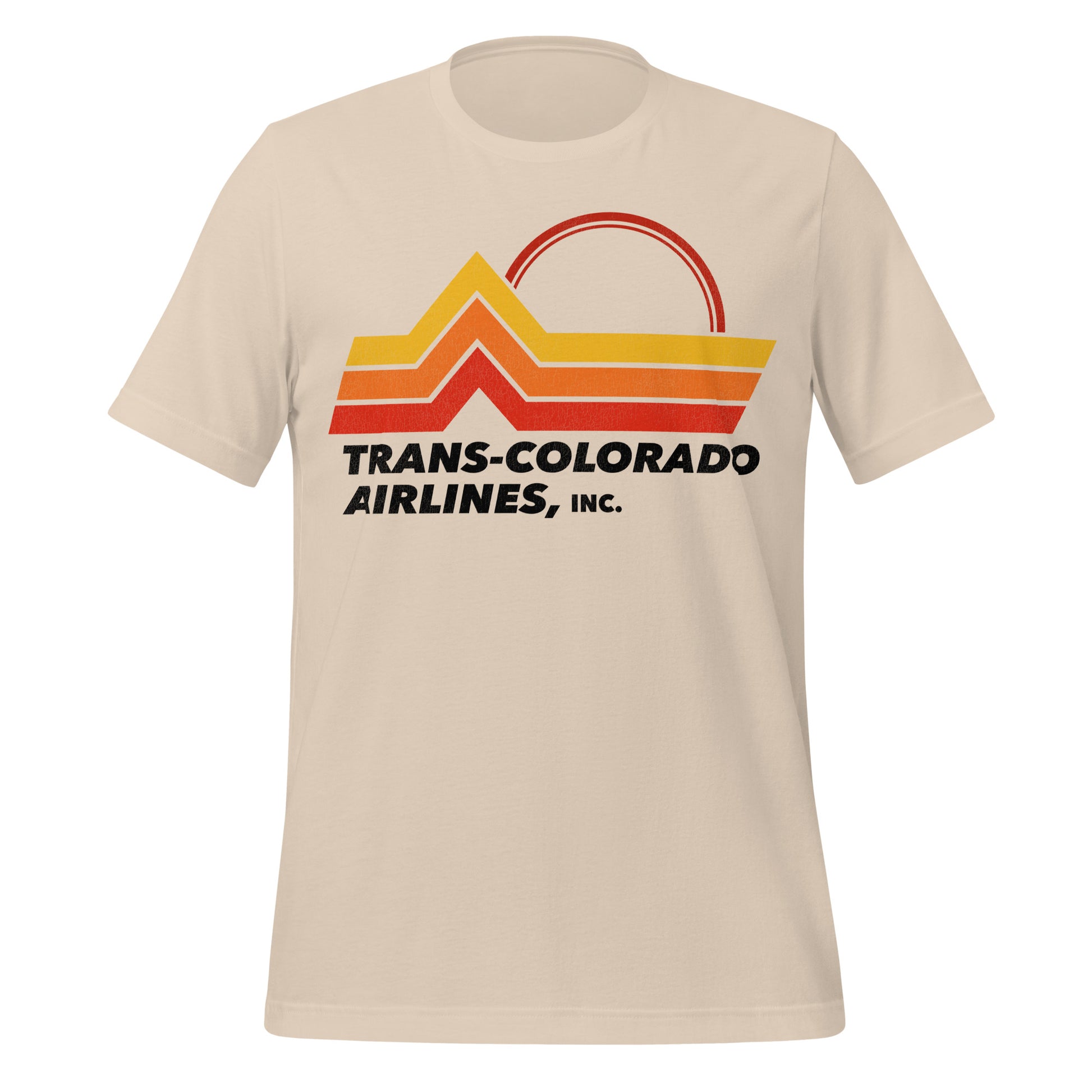 A 70s style soft cream t-shirt with the Trans-Colorado Airlines, Inc. logo of mountains and a red sun. 