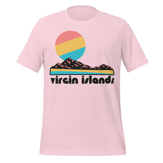 A soft pink vintage 70s style souvenir Virgin Islands t-shirt with the image of a striped yellow and blue beach and ocean, a rocky outcropping, and a pink, yellow, and blue sun rising in the distance. References the National Park on Saint Jhn, along with the US Virgin Islands, including Saint Thomas, Saint Croix, and many smaller islands in the Caribbean, near Puerto Rico. 