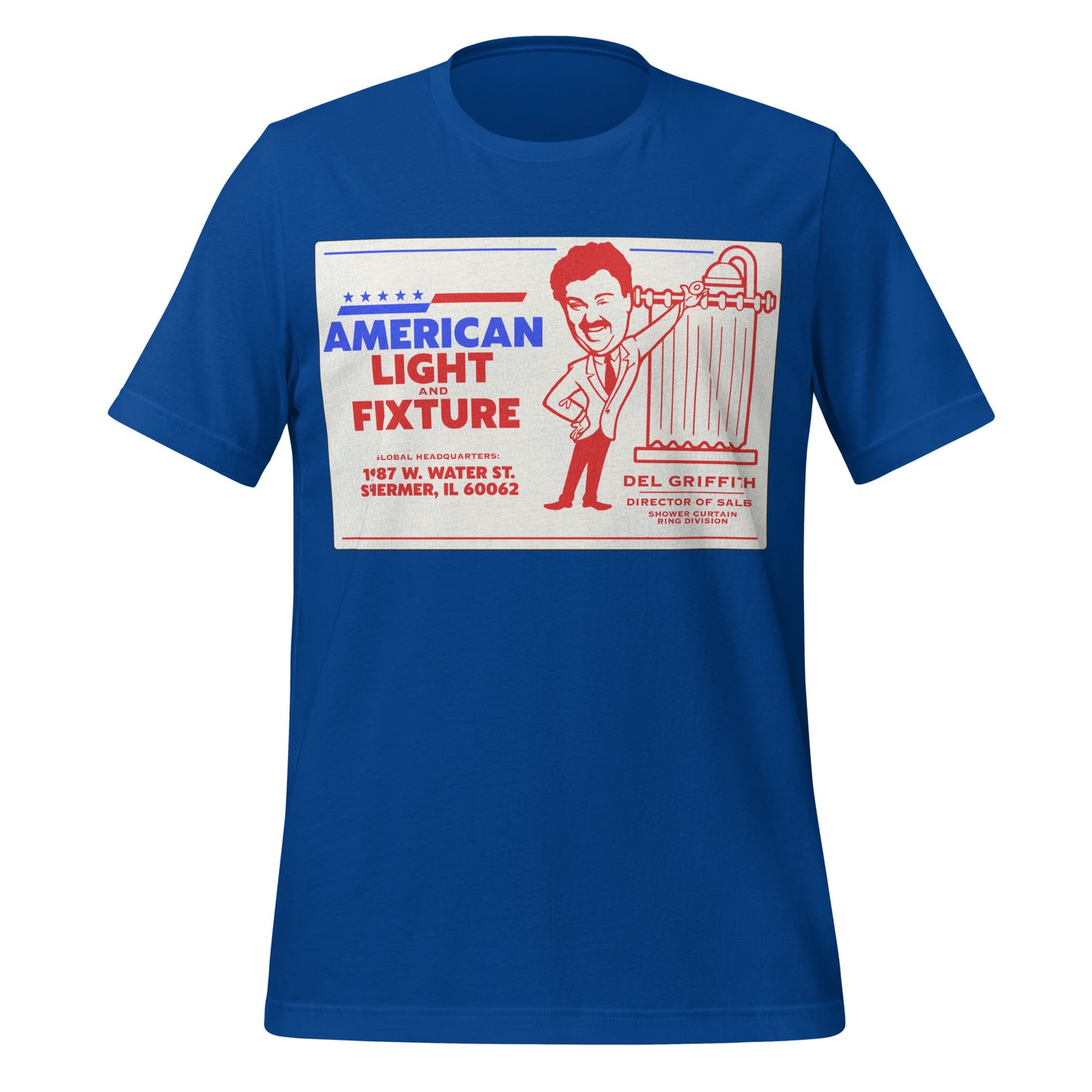 A vintage royal blue t-shirt for "American Light and Fixture" with the image of a man in a suit next to a shower with a shower curtain. The t-shirt says "Del Griffith", "Director of Sales", and "Shower Curtain Ring Division" with the "Global Headquarters" located at "1487 w. Water St., Shermer, IL 60062. Reference to John Candy's character from the movie "Planes, Trains and Automobiles". 