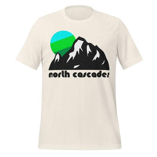 A vintage white colored souvenir North Cascades t-shirt with an image of a mountain range, its sides covered in snow, and a beautiful blue and green colored sun setting in the distance. References North Cascade National Park and North Cascade Mountain Range in Washington State near Seattle, known for its hundreds of glaciers, hiking trails, and skiing. 