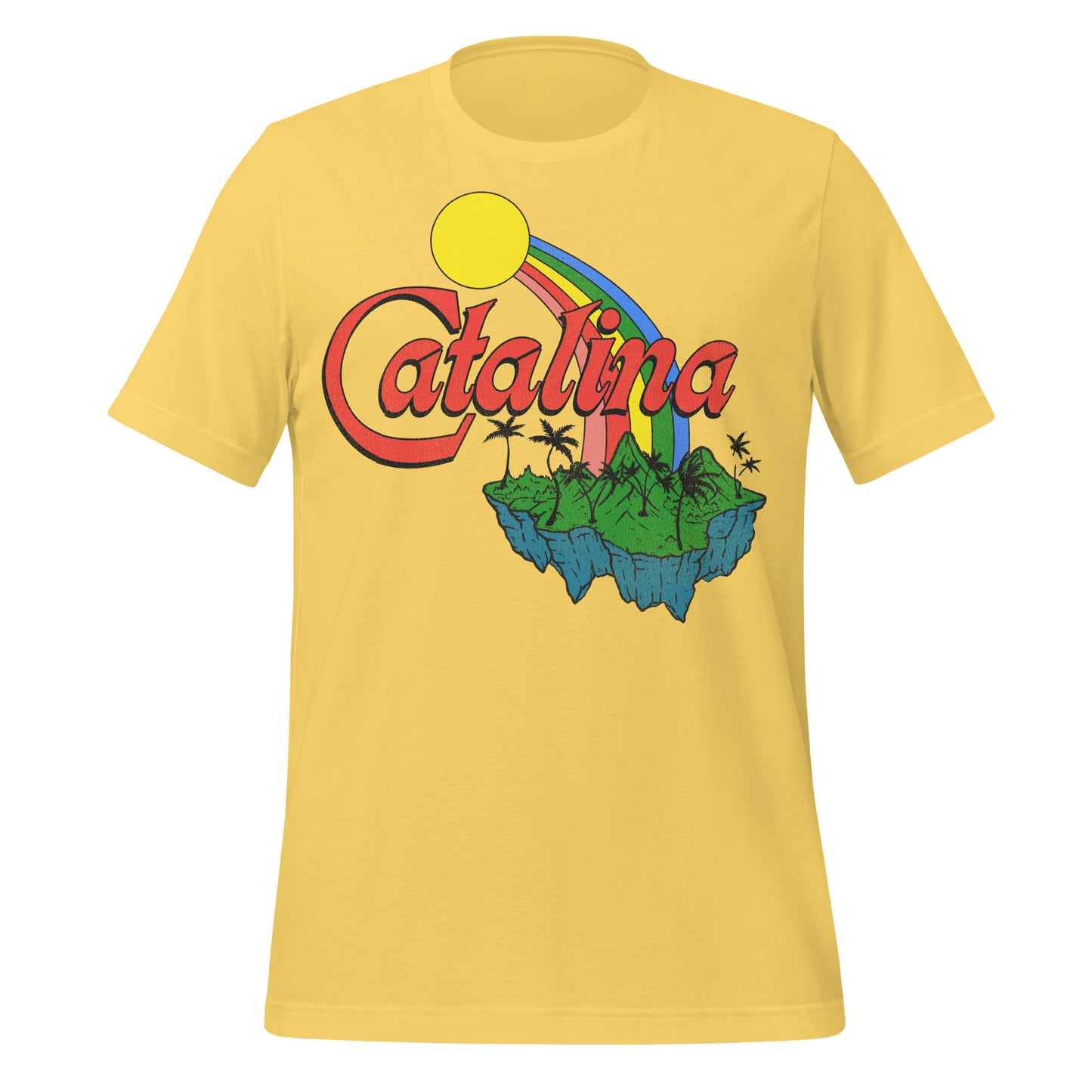 A travel yellow t-shirt that says "Catalina", referencing the California Channel Island location in the Pacific Ocean. Image of a green island, a red, pink, yellow, green, and blue rainbow, and a bright neon circle sun. 