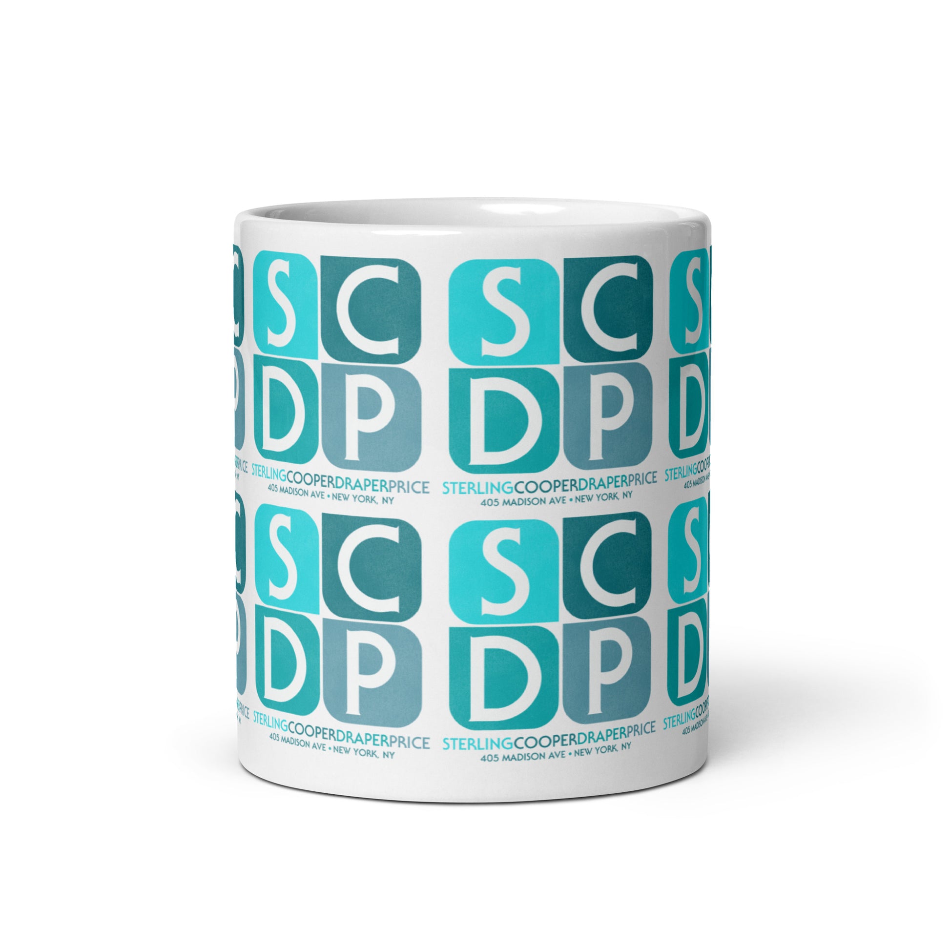 A glossy white tea and coffee mug from the Mad Men agency Sterling Cooper Draper Pryce. Includes address of "405 Madison Ave + New York, NY" and a blue SCDP logo repeated. 